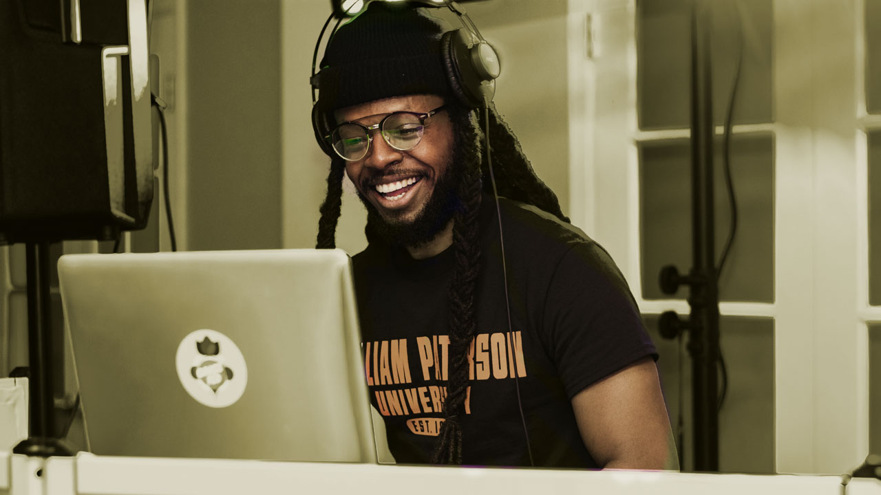 Radio DJ interacting with a fan through Intune in the studio.