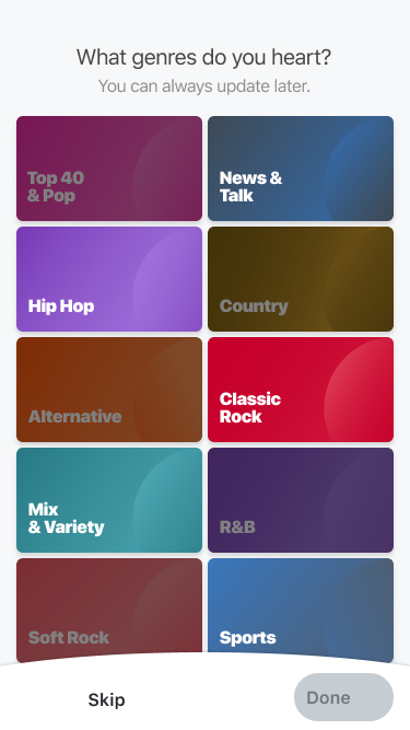 Genre picker screen with selected tiles indicated by darkened overlay.