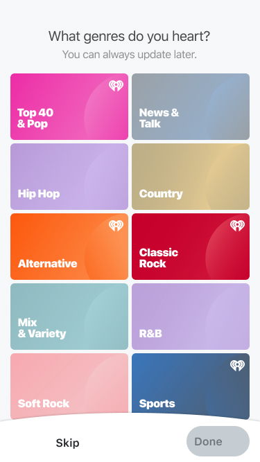 Genre picker screen with selected tiles indicated by no opacity.