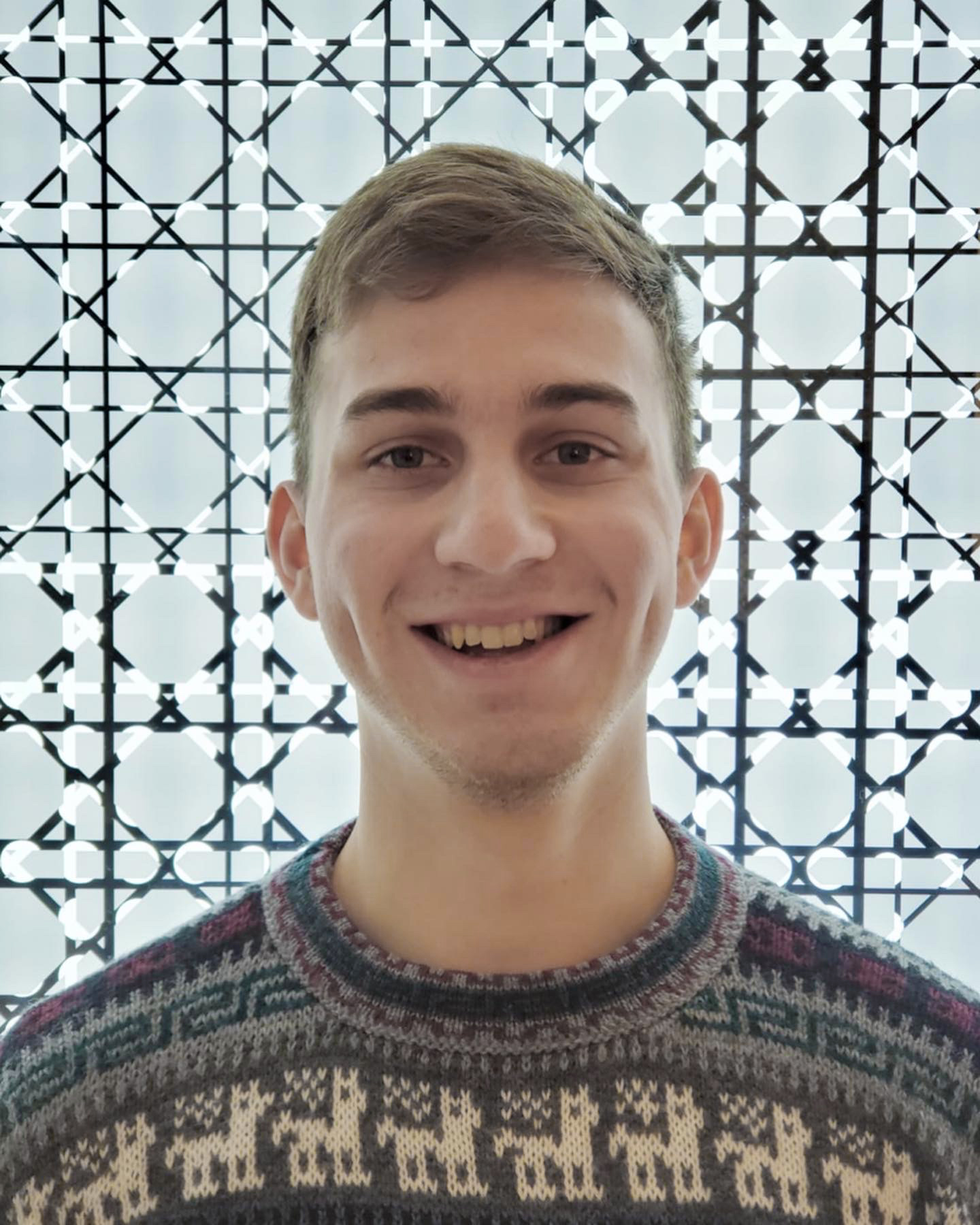 A portrait photo of me smiling.