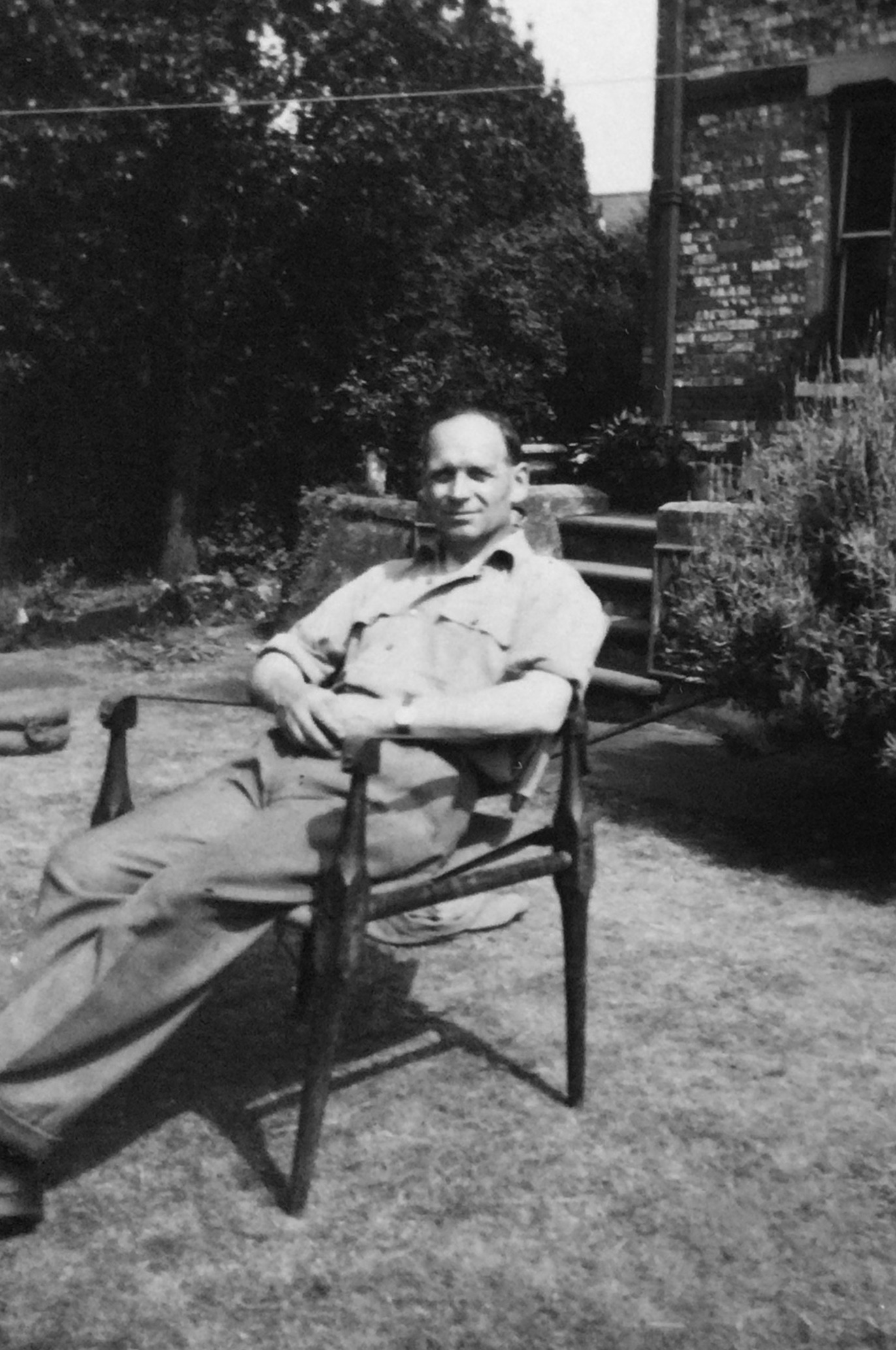 Leslie Amlot in his garden.