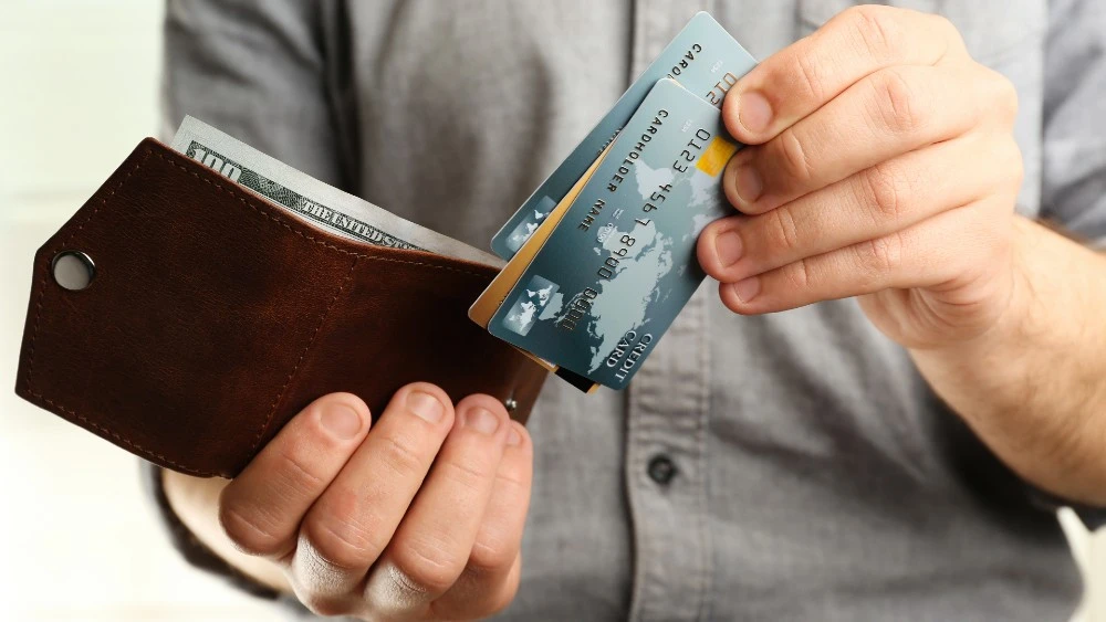 Holding Credit Card