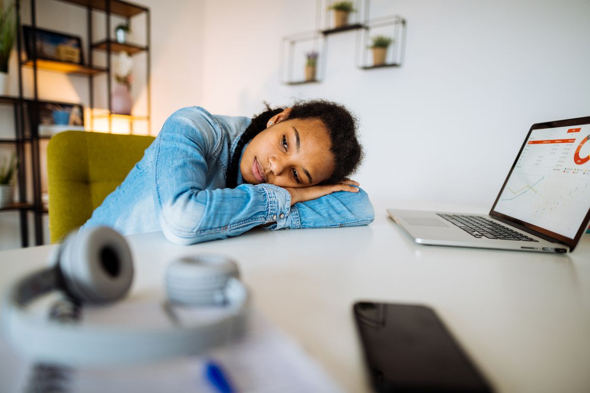 person sitting in front of a computer