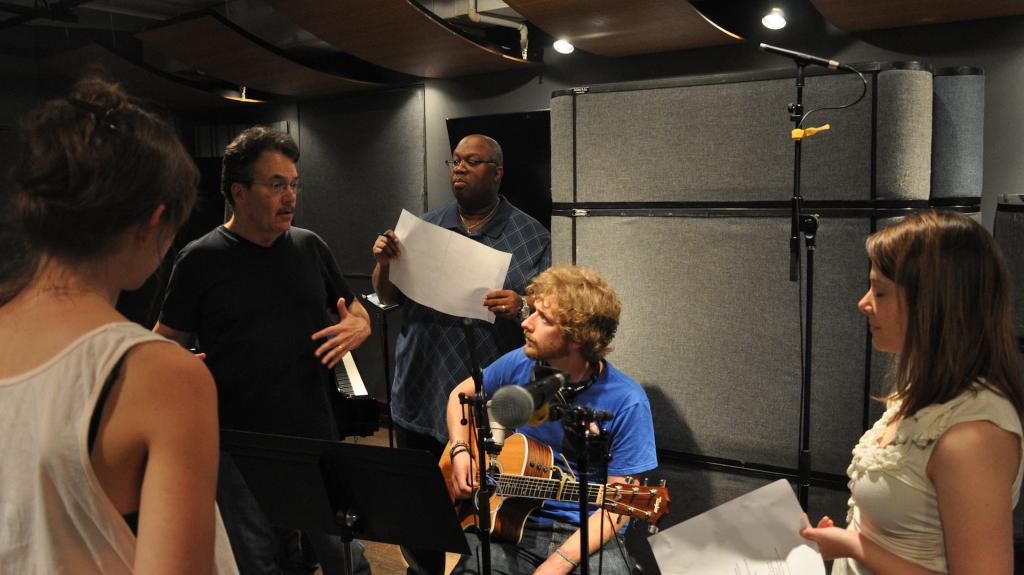 Image of students in a recording studio.