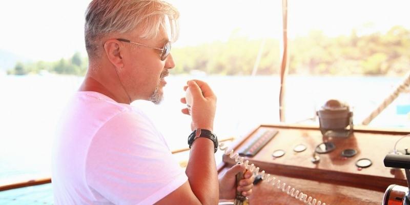 man using vhf radio
