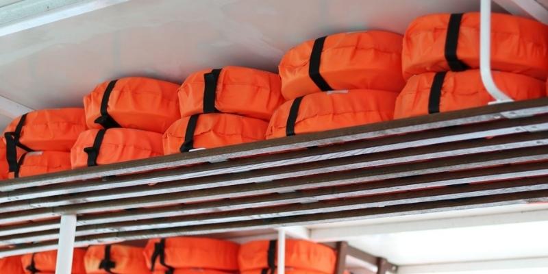 life jackets stowed away on a boat