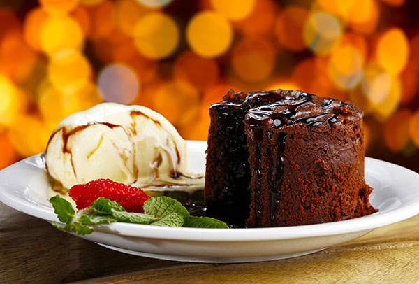 A tasty selection of homemade authentic Italian desserts including classics such as tiramisu and panna cotta.