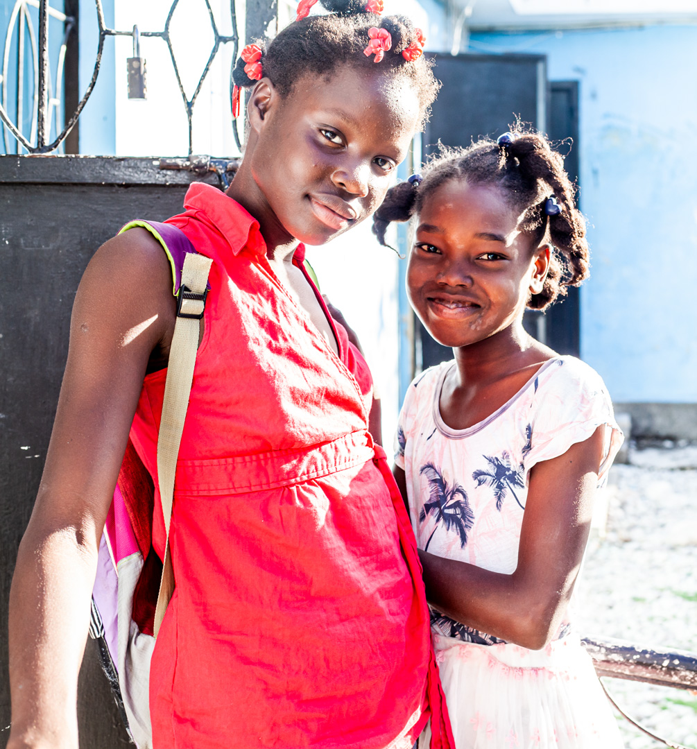 Two girls looking at the camera.