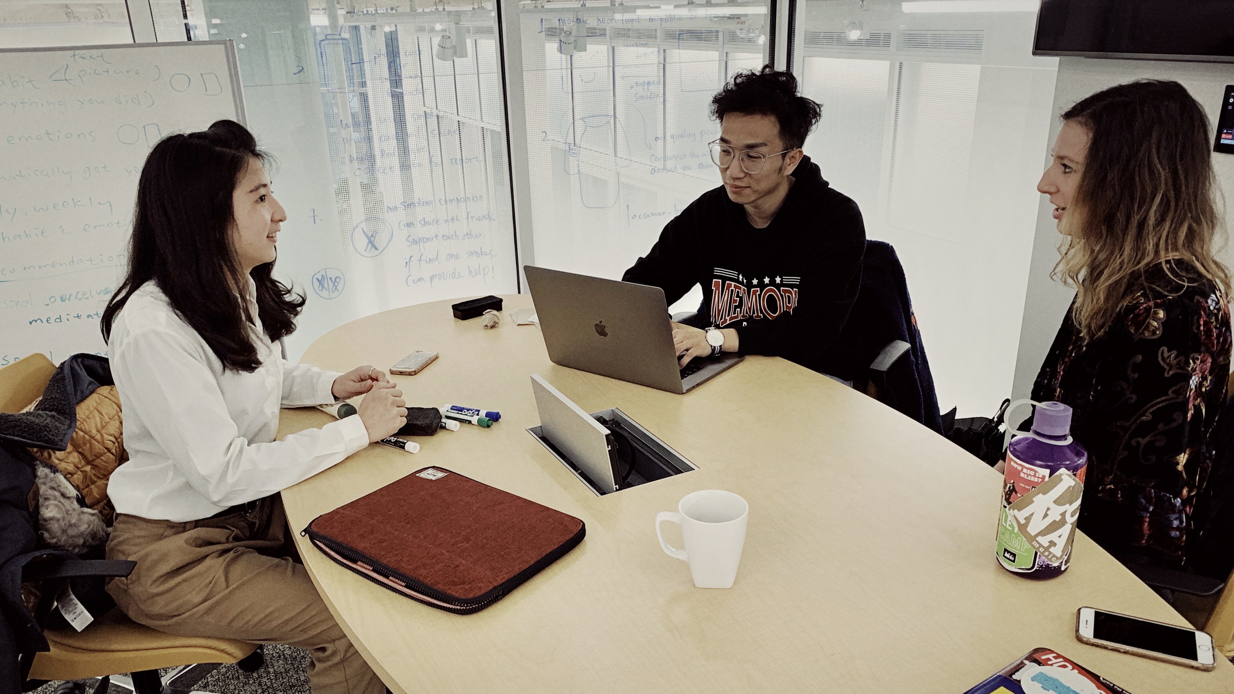 Me (center) in a group meeting of a school project.