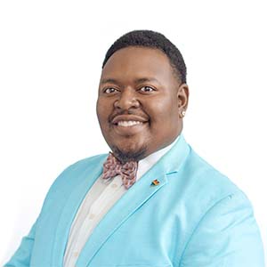 A photo of Stedmond, a person with dark drown skin, short black hair, in a bright blue suit