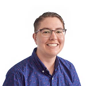 Photo of Keaton, a person with white skin, glasses, and a blue shirt