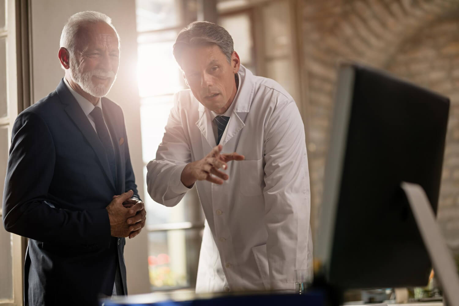 Doctor and attorney discussing case.