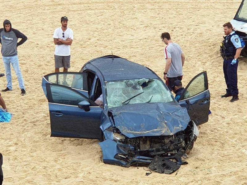 car destroyed at the beach