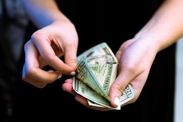 a person counting money