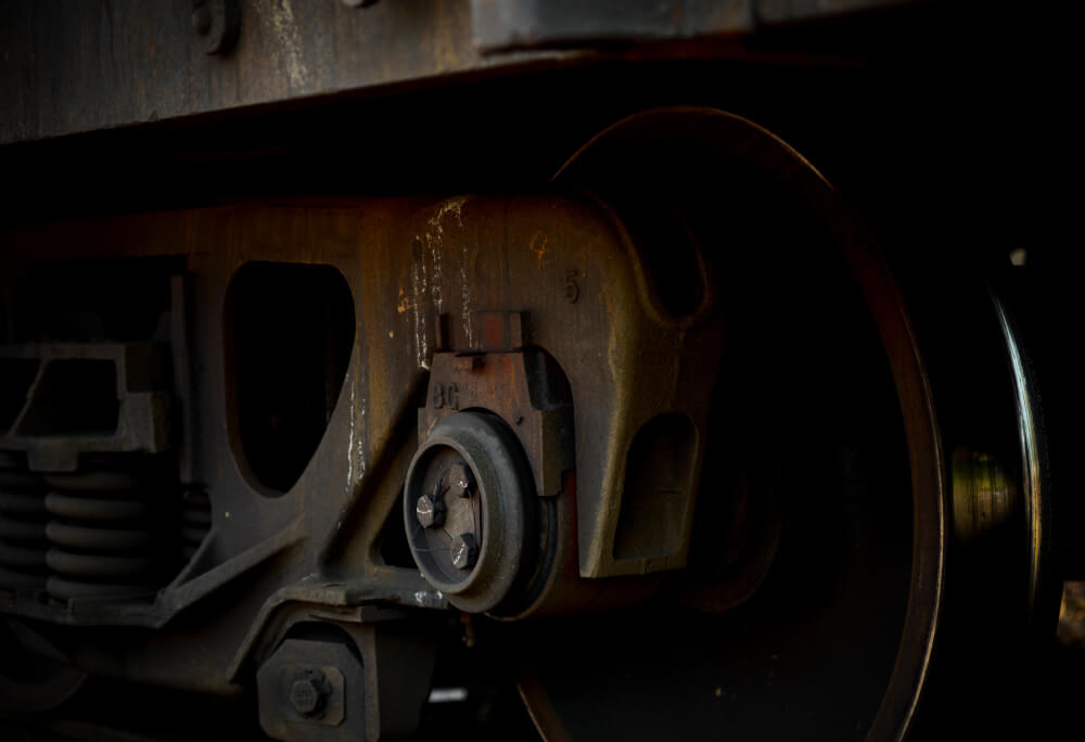 close up of the wheels of a train