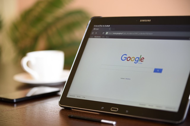 Tablet on a desk with Google open in a chrome tab