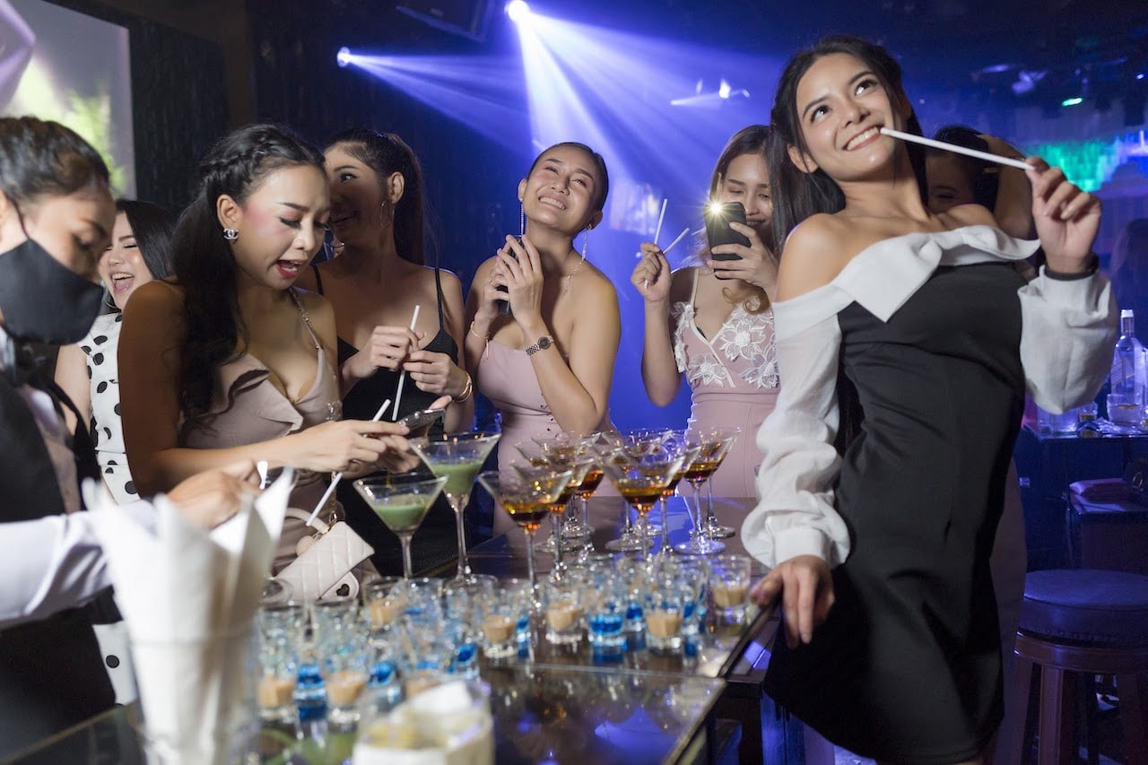 Thai girls partying at a VIP table in a gentlemen club