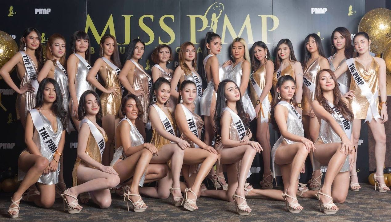 gorgeous Thai girls in gold and silver dresses for the election of Miss PIMP at The PIMP gentlemen club in Bangkok