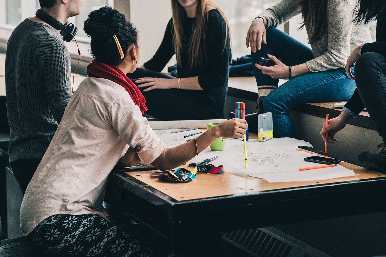 Young man and women in a business meeting