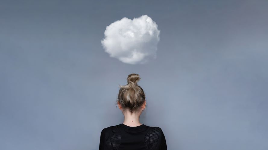 Mental health awareness image - woman with cloud above