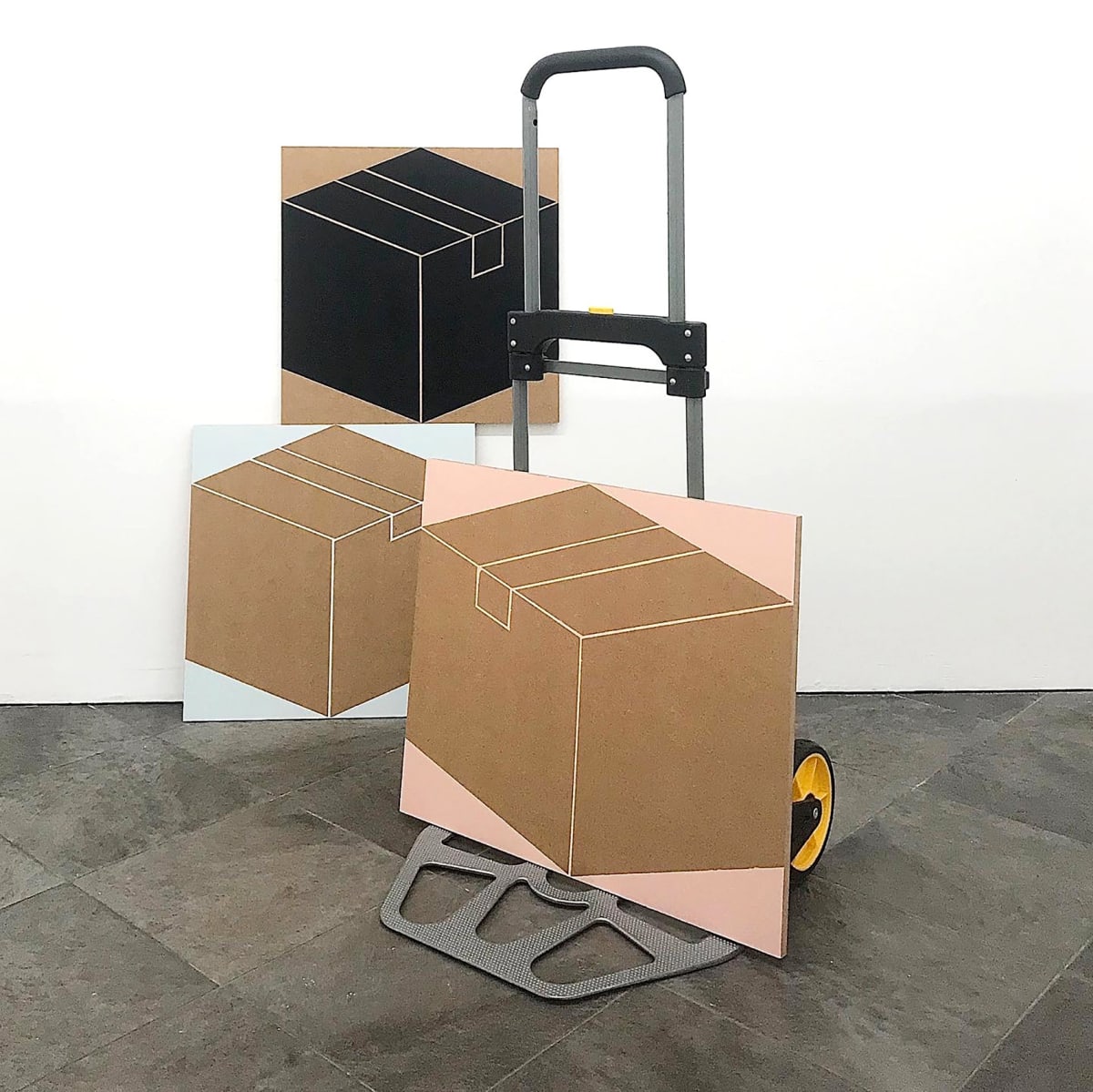 Image shows trolley holding three artworks from contemporary artist Siggi Hofer