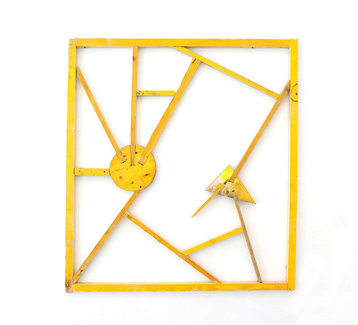 Ernst koslitsch shows a filigree sculpture from yellow building site wood