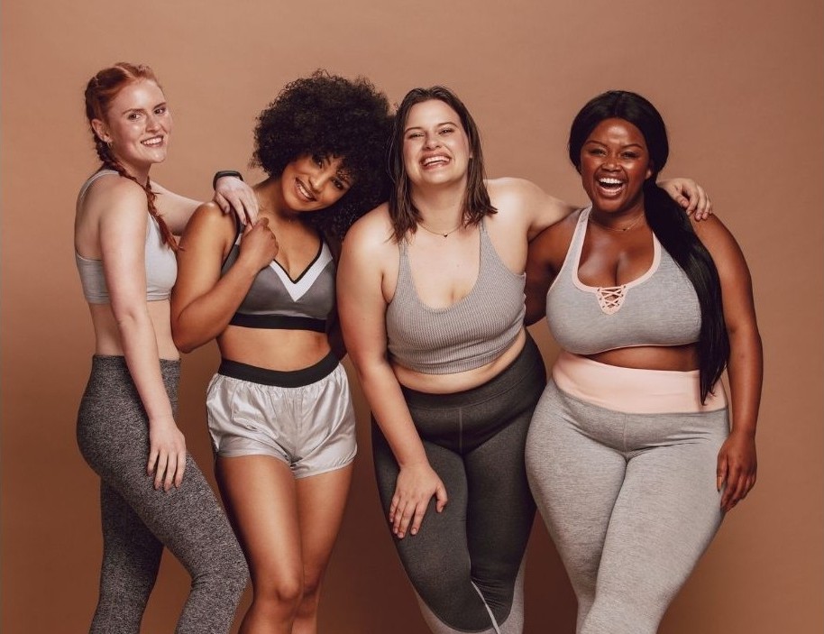 Fitness models of different ethnicities and body sizes.