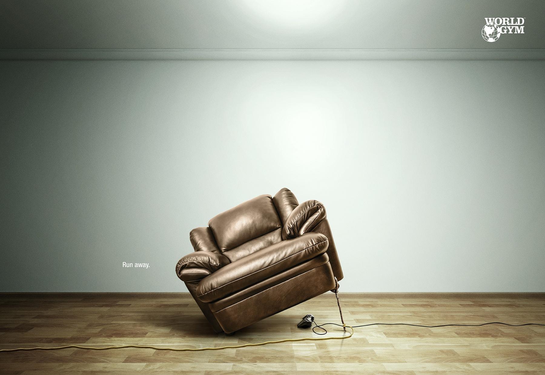 A tilted cushion sofa seat with a rope running through its front right leg.
