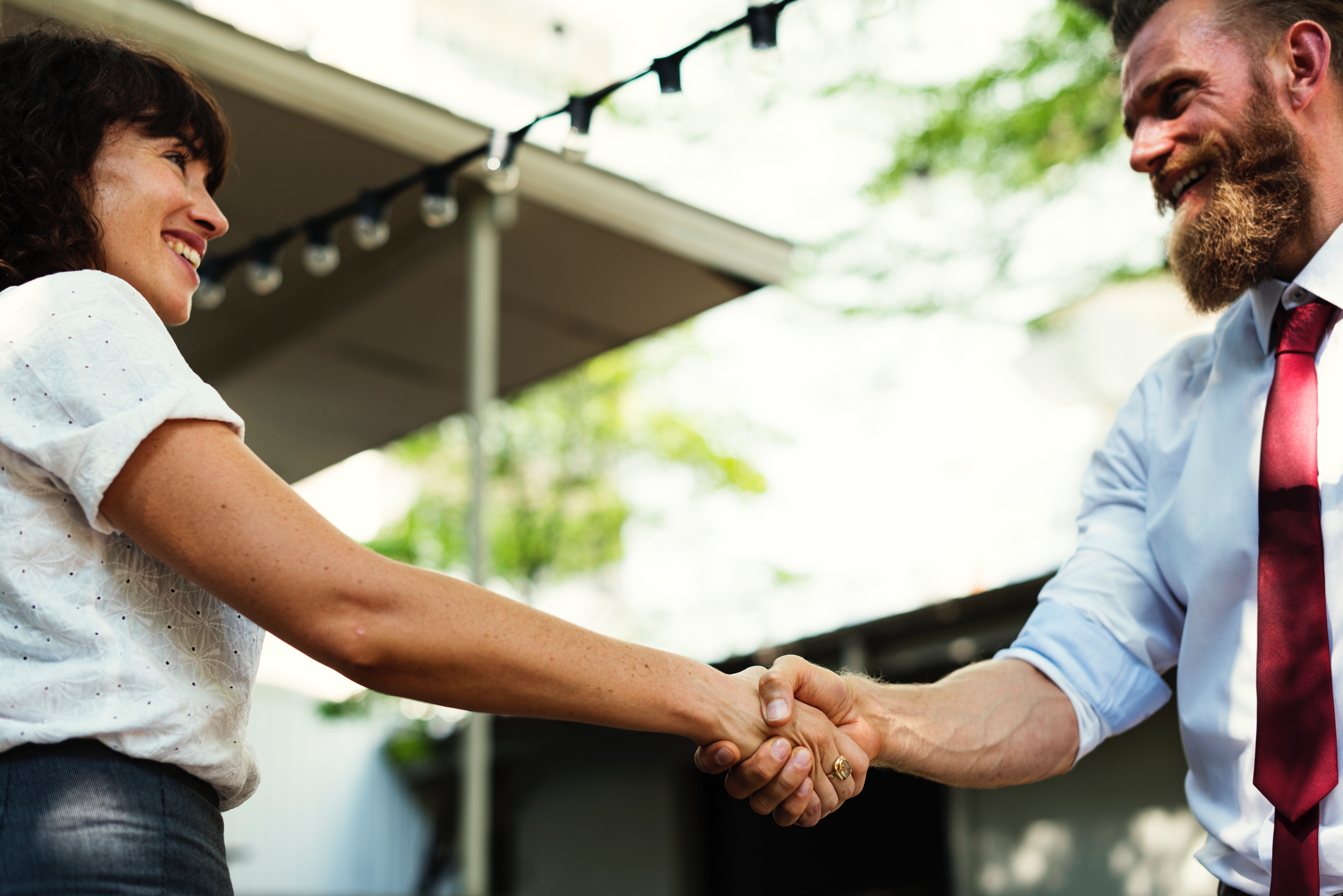 People shaking hands at work