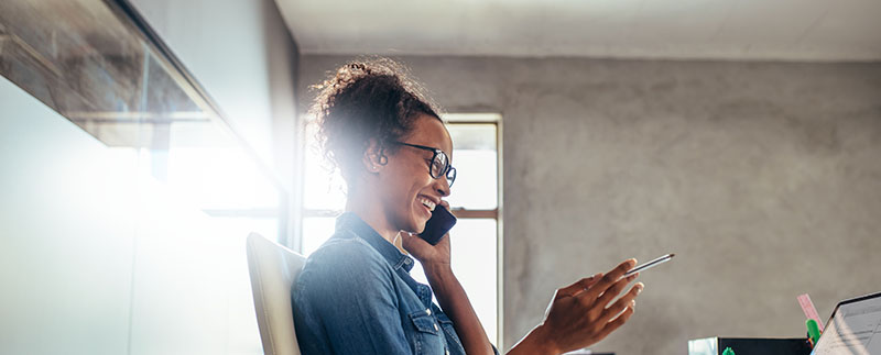 Small business owner using virtual phone system