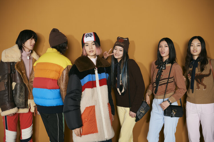 Coach models lined up backstage