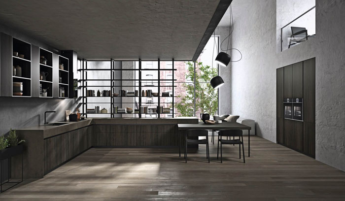 Cucina moderna nera e legno con apertura a gola scura e top in gres con cassetti sottotop in gres
