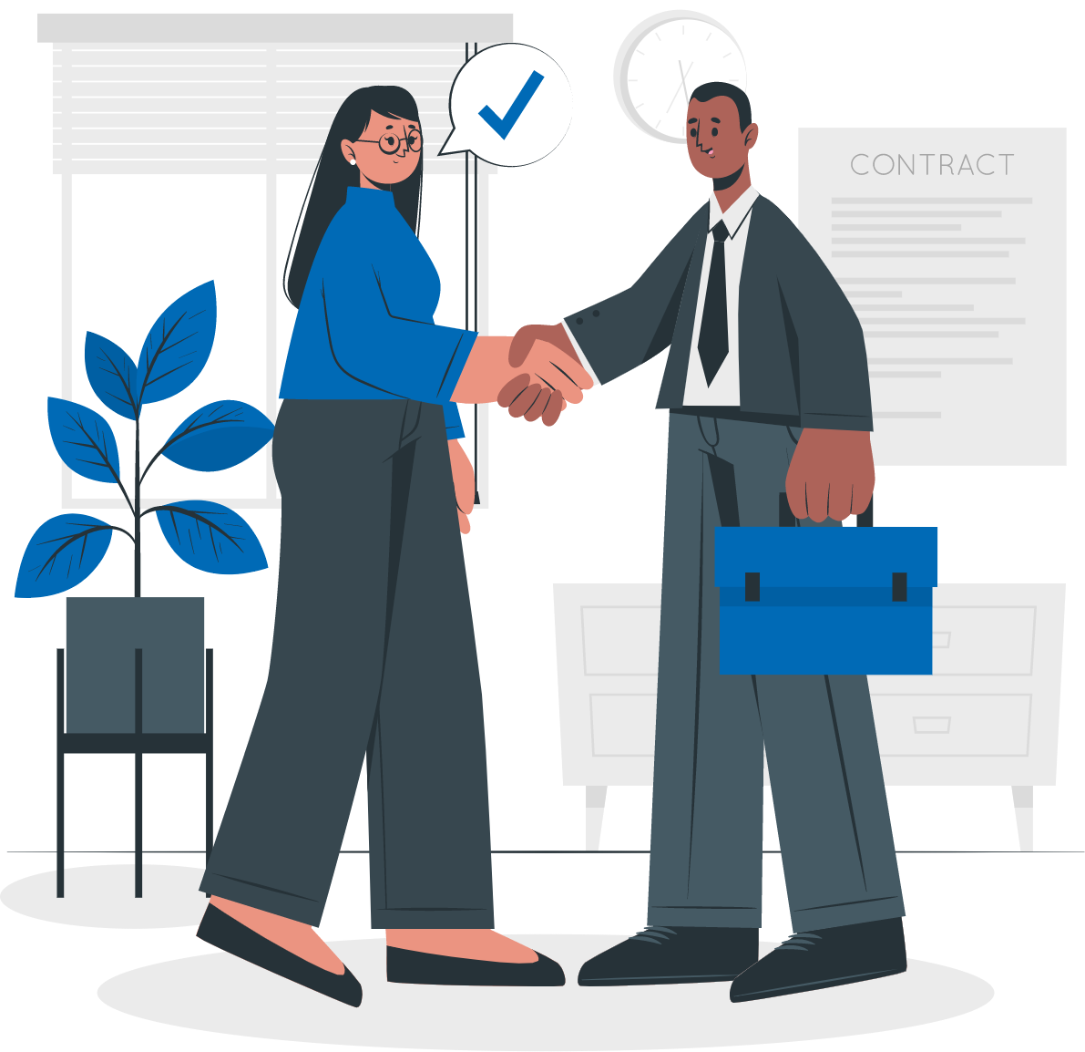 Two people shaking hands during a business deal
