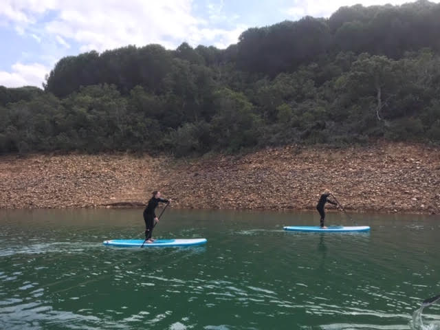 Guests getting to grips with Stand Up Paddling on the gorgeous lake…