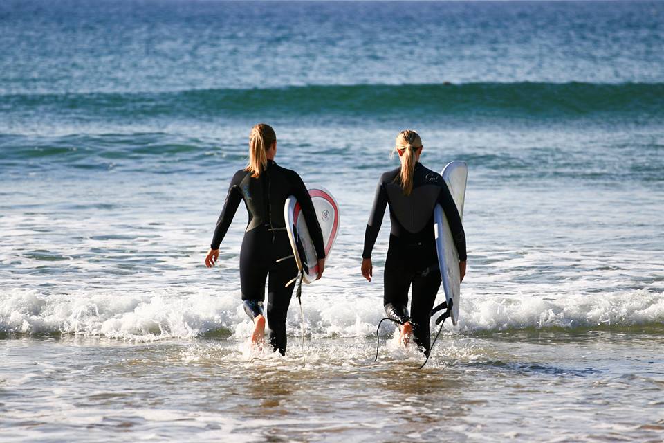Heading out to surf at Watergate Bay….