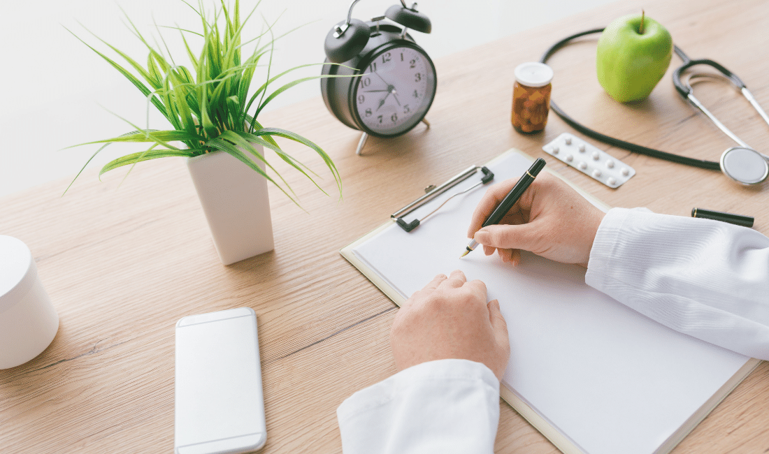 doctor writing notes