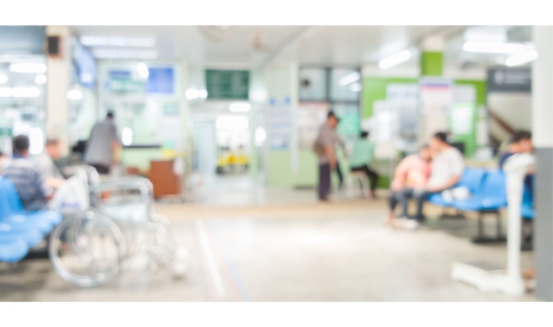 Blurry wheelchair and hospital waiting room