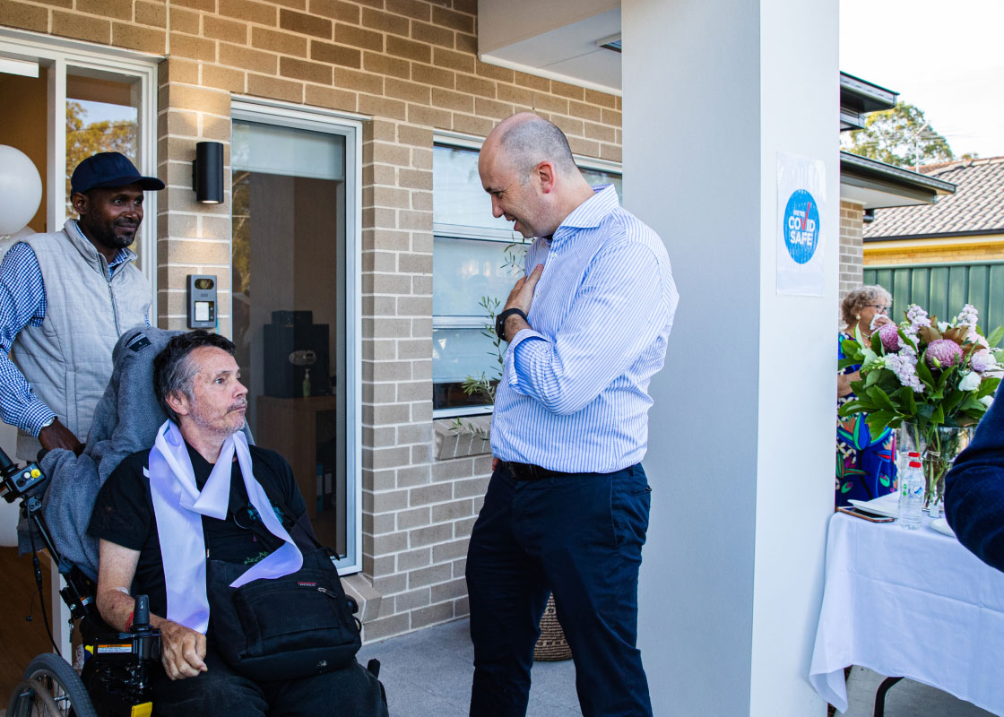 Image of a resident at his new home