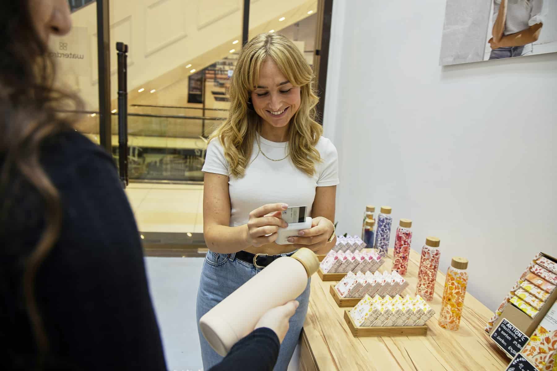 retail operations employee selling to customer