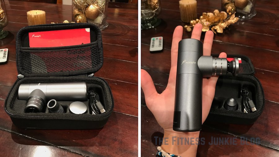 Holding the addsfit mini massage gun in the palm of a hand.