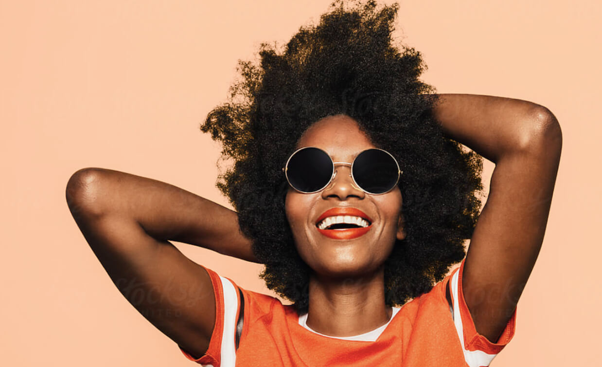 smiling african american woman with sunglasses