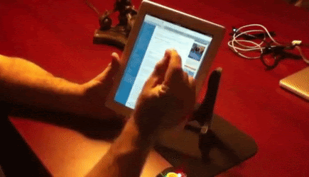 A person pinching to zoom on a website that isn't responsive.