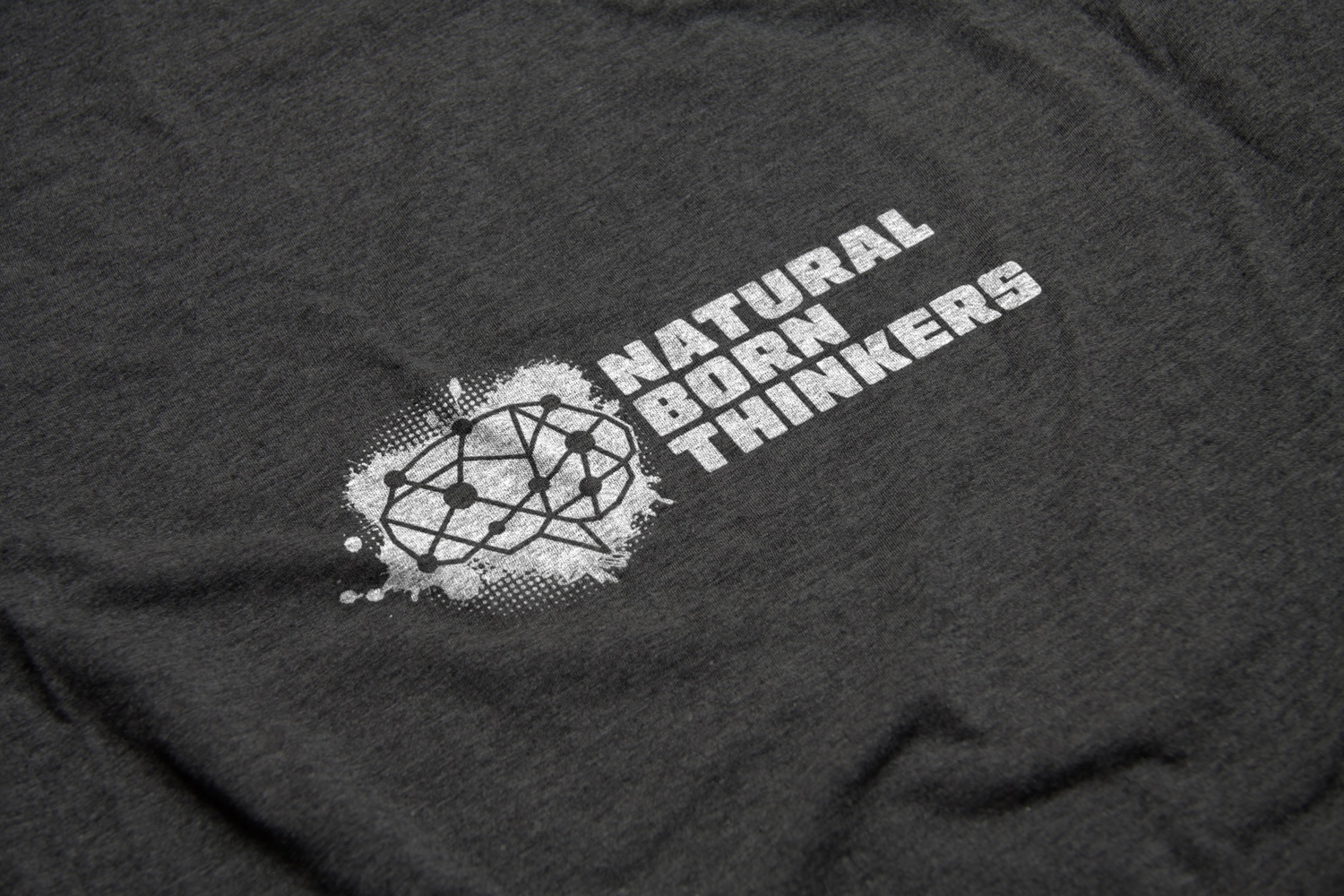 Natural Born Thinkers Logo Design by Carl Gamble on a t-shirt