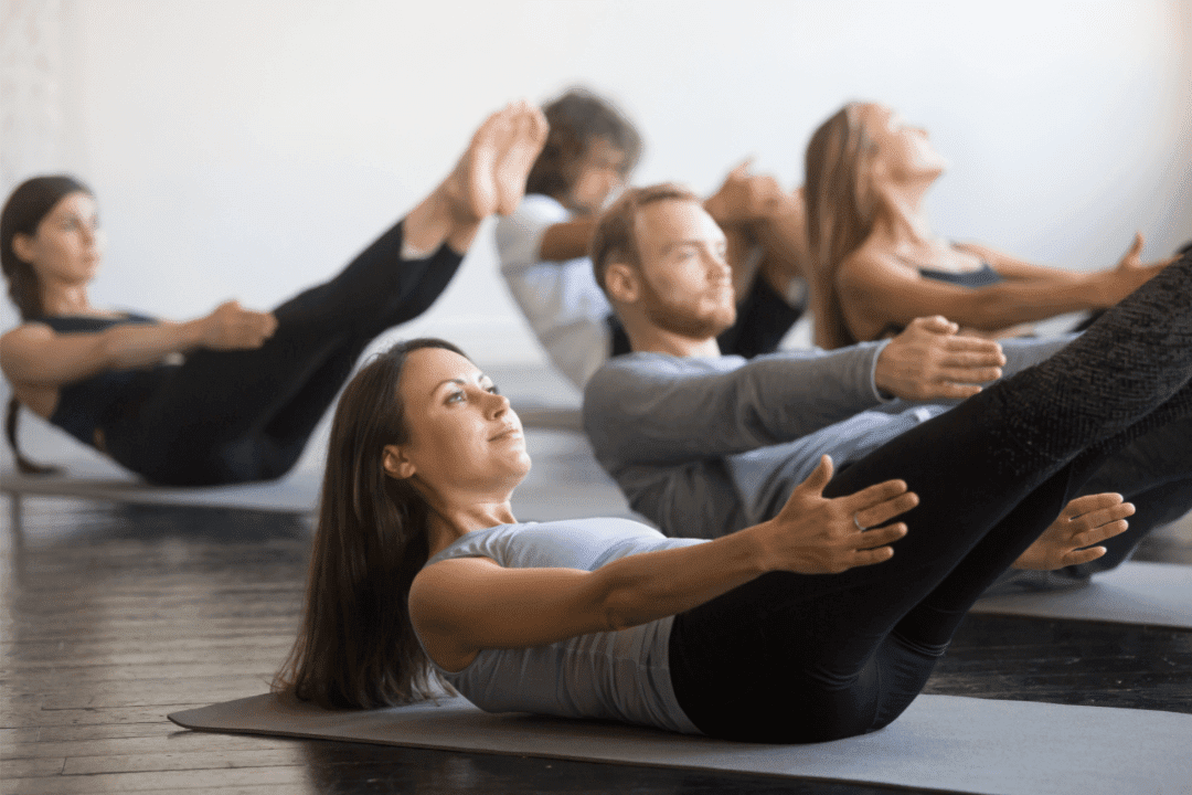 pilates group class core exercsies