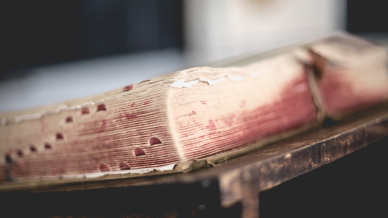 Worn bible on pulpit