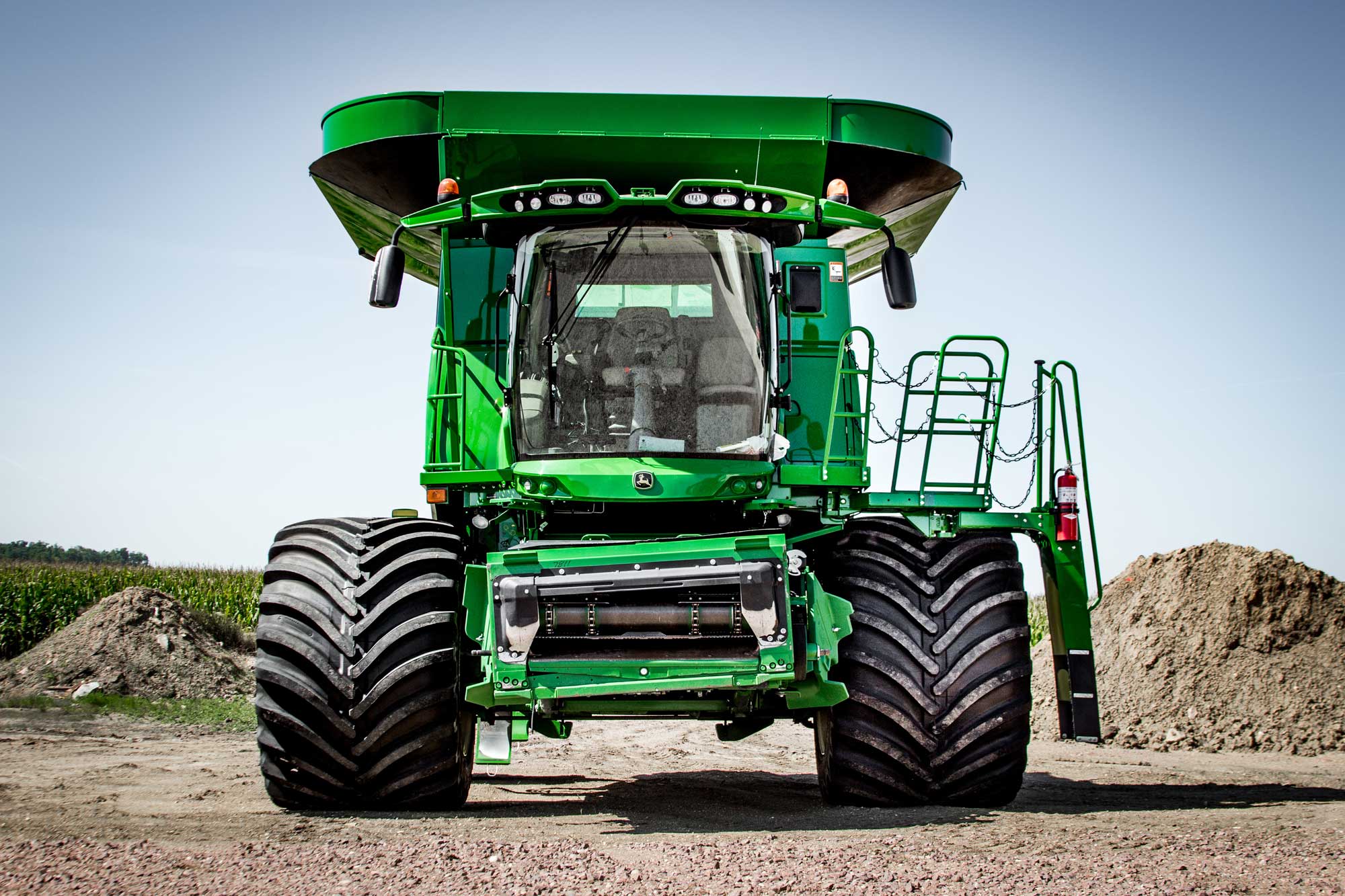 A John Deere combine with Goodyear LSW 1400/30R46 super single tires.