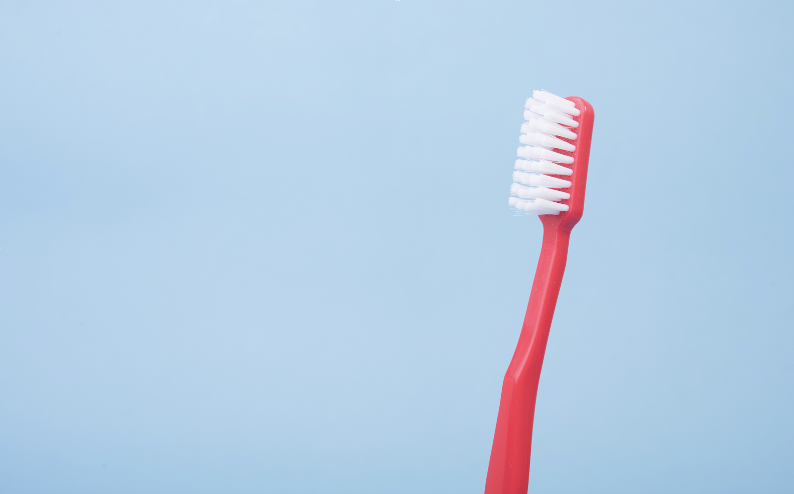manual toothbrush pros and cons