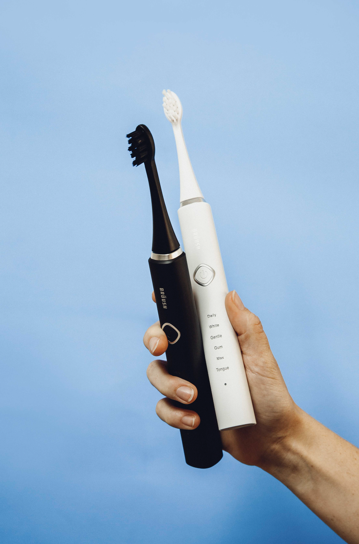 how to brush your teeth with an electric toothbrush