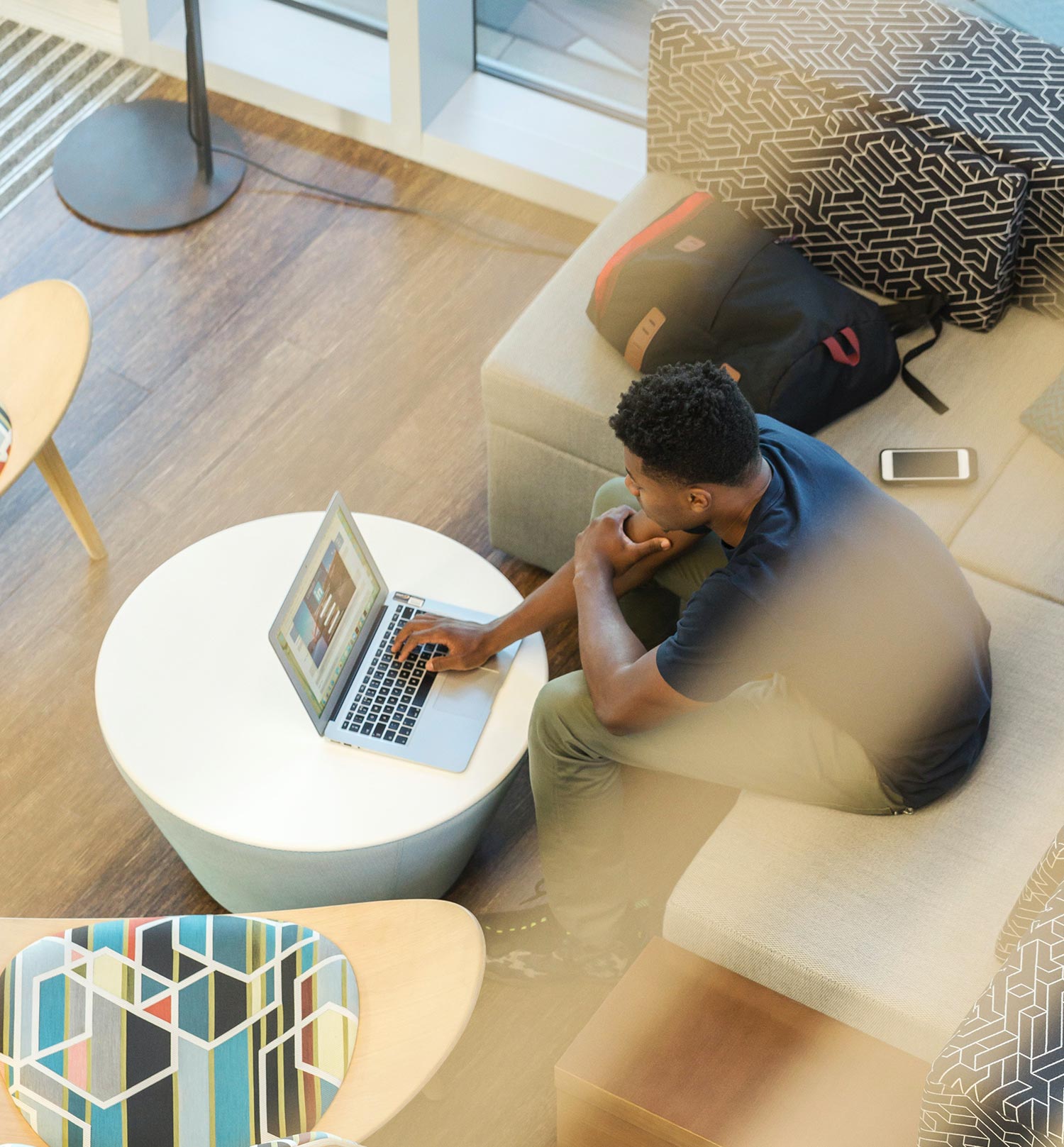 Man learning on his computer via the Guide platform