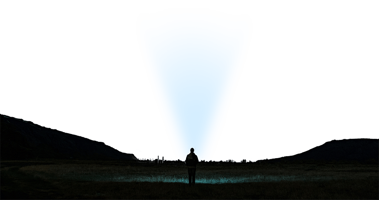A man looking at the night sky
